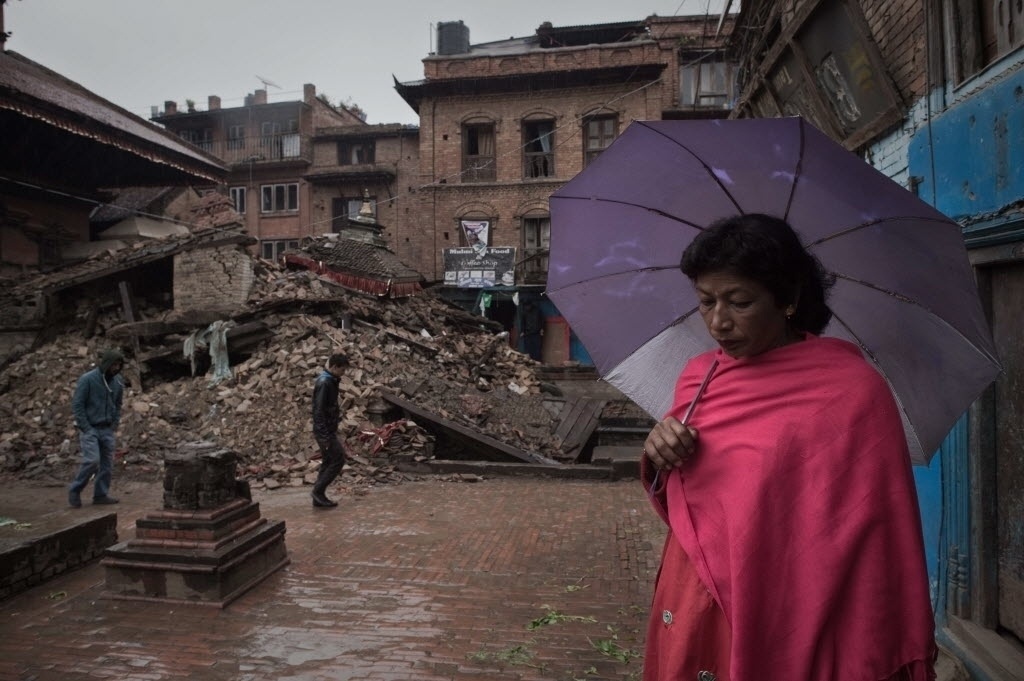 Woman amid destruction in  Bhaktapur, on the outskirts of Kathmandu