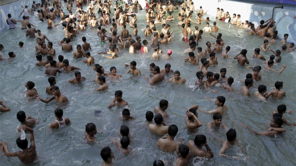 Indians-seek-refuge-from-heat-in-swimming-pool.jpg